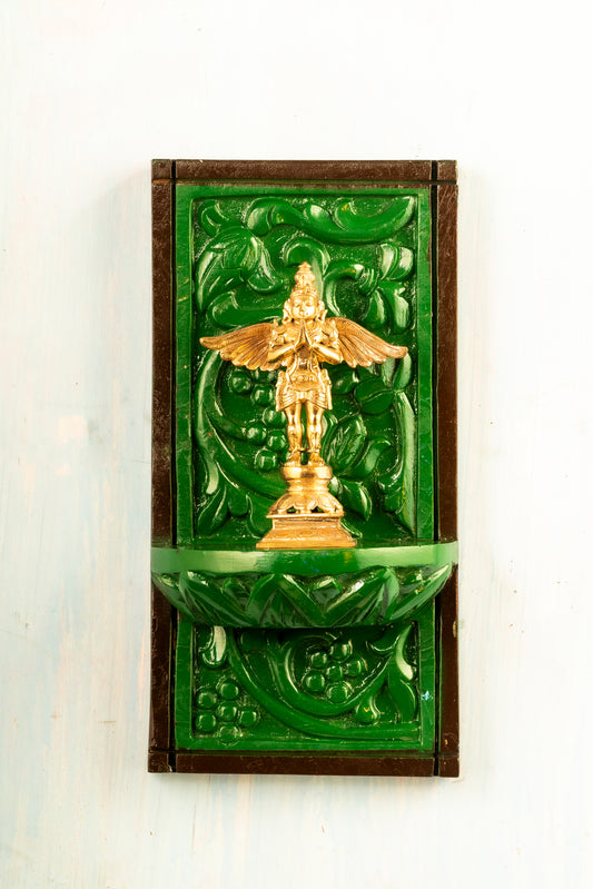Bronze Garudan 6" placed on a hand crafted wooden wall frame
